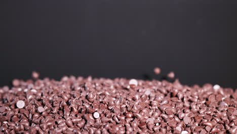 chocolate chips cascading onto a pile