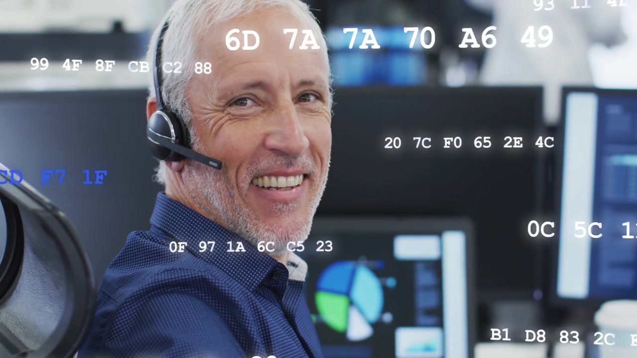 Vertical video: Tech operator adjusting headset monitoring charts and smiling under code overlay
