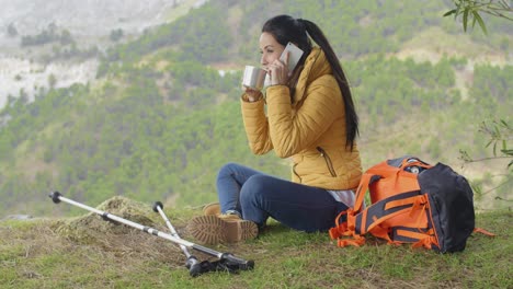 Happy-backpacker-on-phone-and-waving-hand