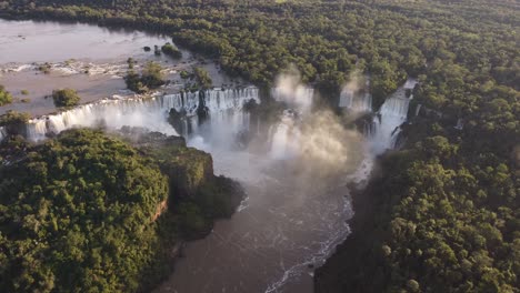 aerial birds eye shot of scenic waterfall in