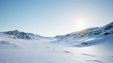 Aerial-Landscape-of-snowy-mountains-and-icy-shores-in-Antarctica