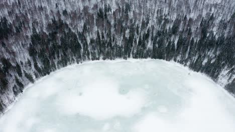 Frozen-volcanic-Saint-Ann-or-Sfanta-Ana-lake-crater,-Romania