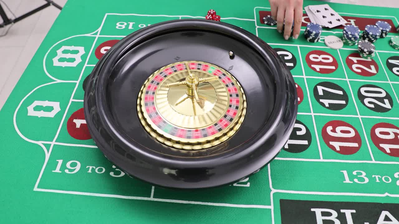 Playing roulette at a casino table
