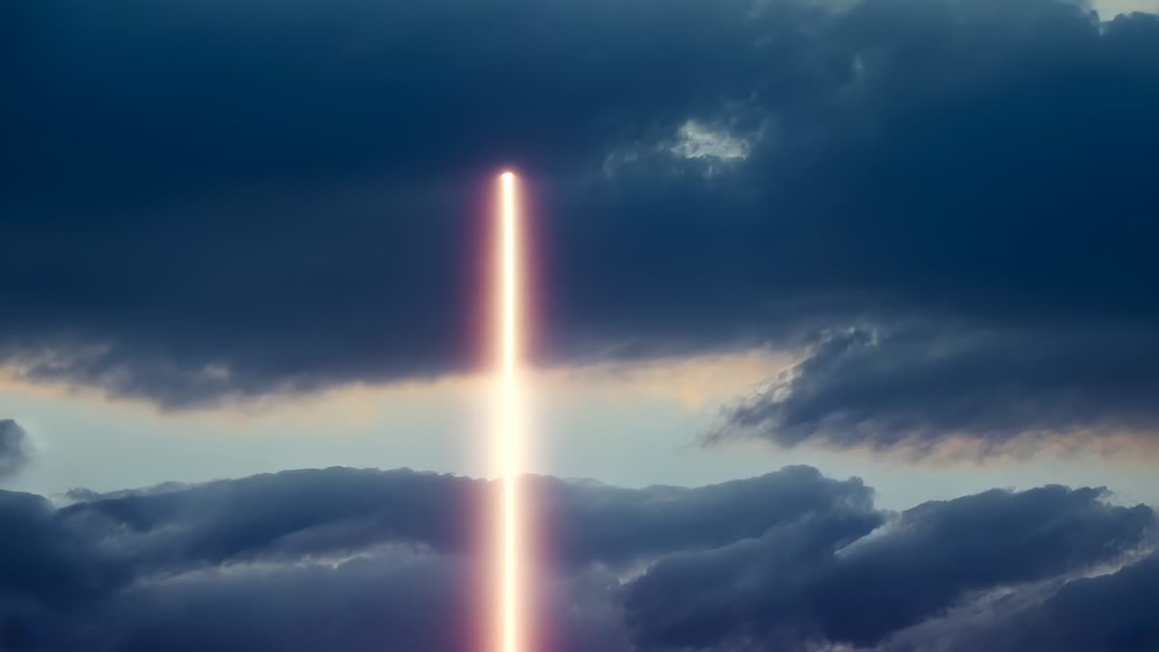 Appearing bright beam extending through layered clouds toward horizon, brightening cloud bases