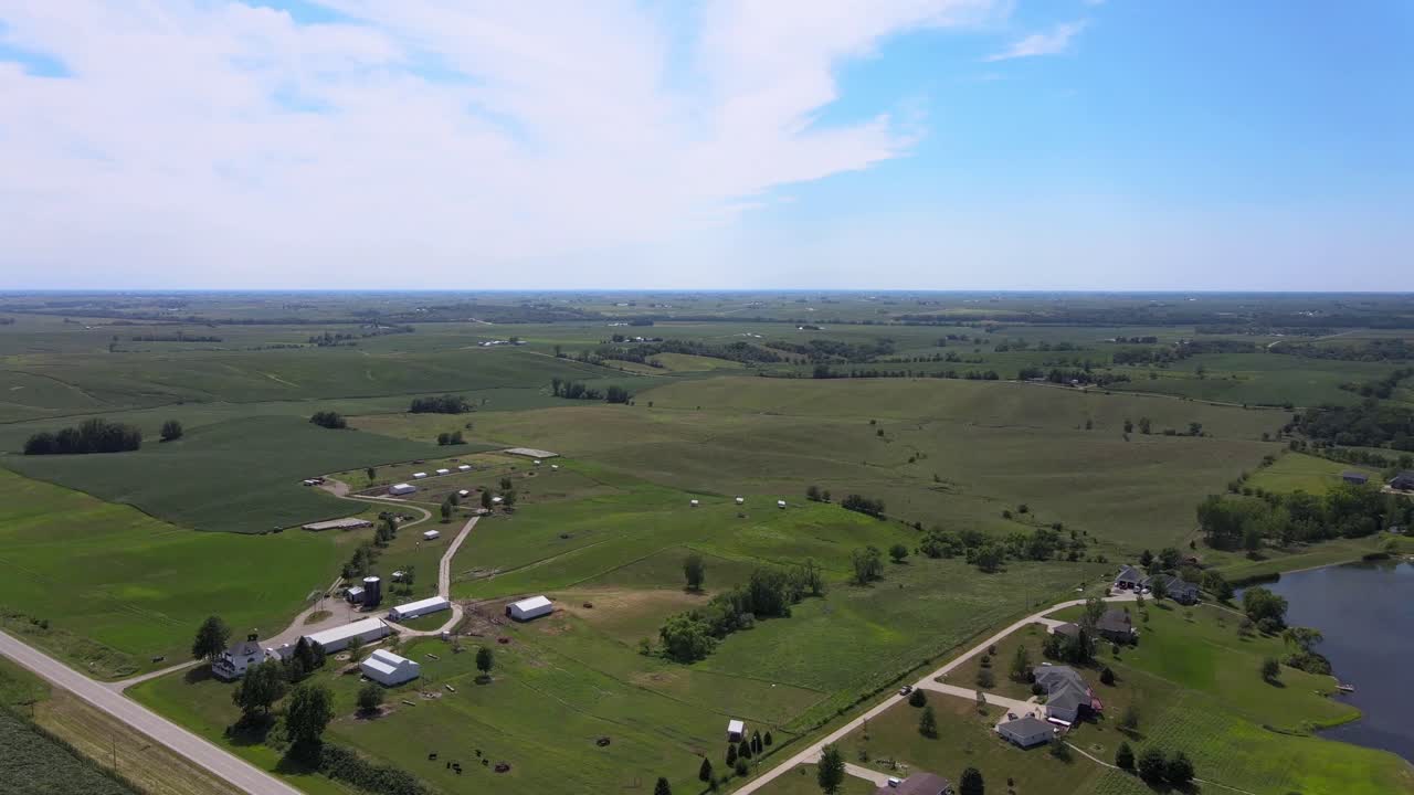Aerial Drone Video Of Rich, Green Rural, Agrarian Agricultural Farmland Corn And Bean Midwest Heartland Of Iowa