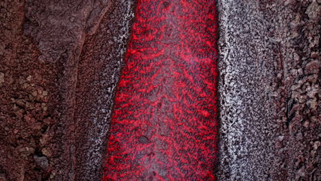 molten lava flows from etna, sicily, creating vibrant visual terrain