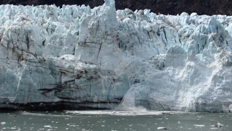 ice melting from the margerie glacier and falling in the bay waters, alaska