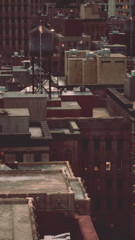 aerial view of city rooftops at dusk