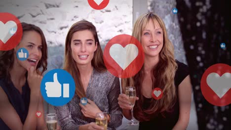 animation of social media reactions over happy caucasian female friends drinking wine and talking