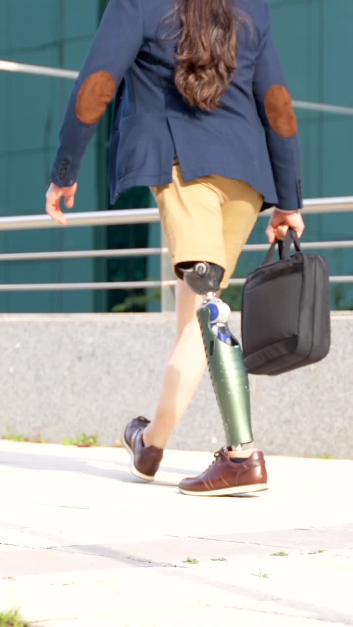 Person with Prosthetic Leg Walking in the City