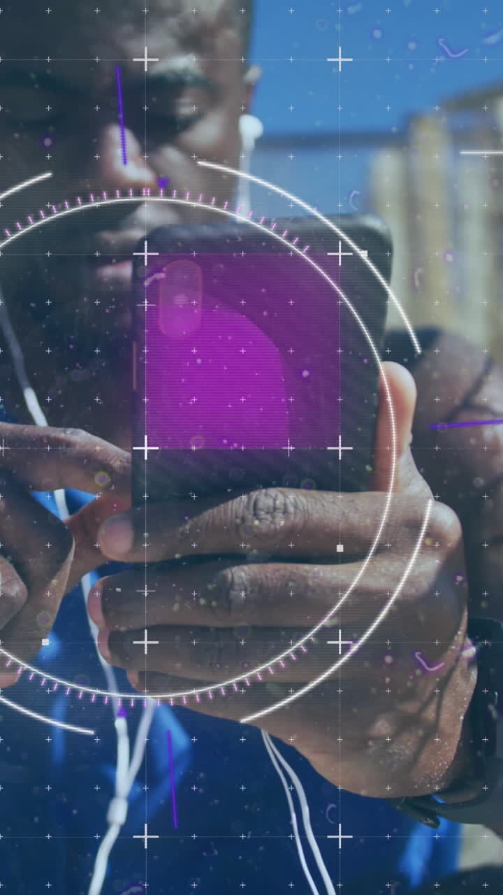 Animation of scope scanning over african american man using smartphone outdoors