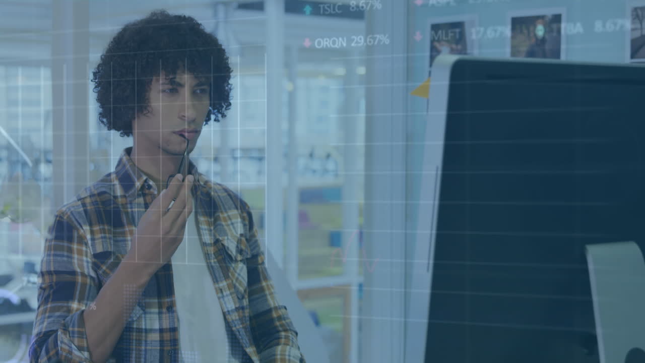 Animation of financial data processing over biracial businessman in office