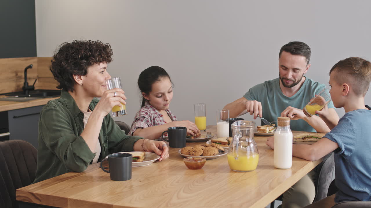 Modern Family With Two Kids Having Breakfast Together