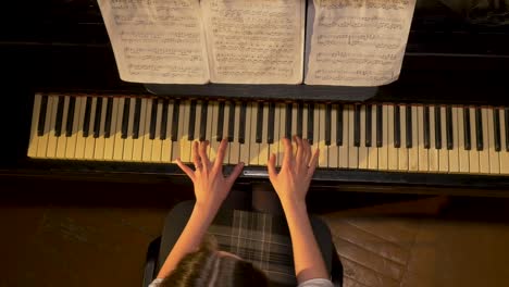 girl playing vintage piano