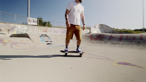 thrilling skateboarding adventure: old white male riding a surf skate in germany