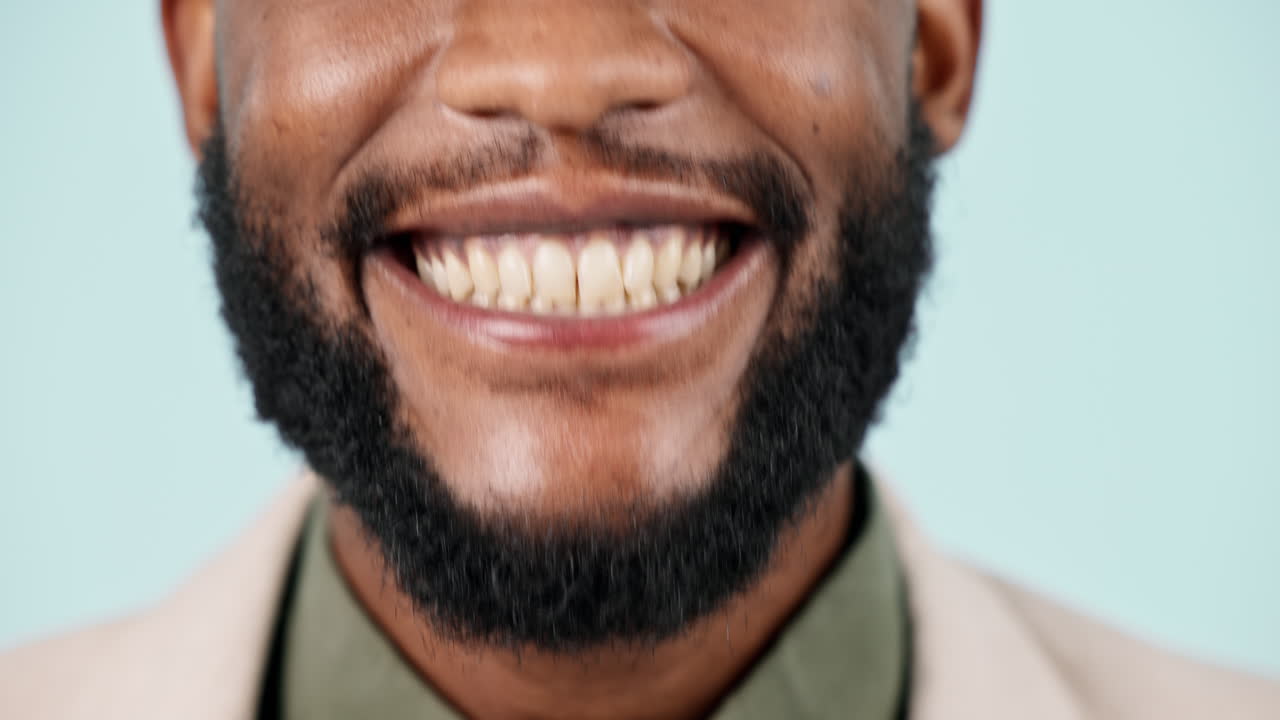 Mouth, teeth and closeup smile of man in studio