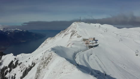 Aerial-of-ski-resort-on-a-beautiful-snow-covered-mountain