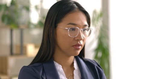 Glasses,-face-and-serious-woman-on-computer