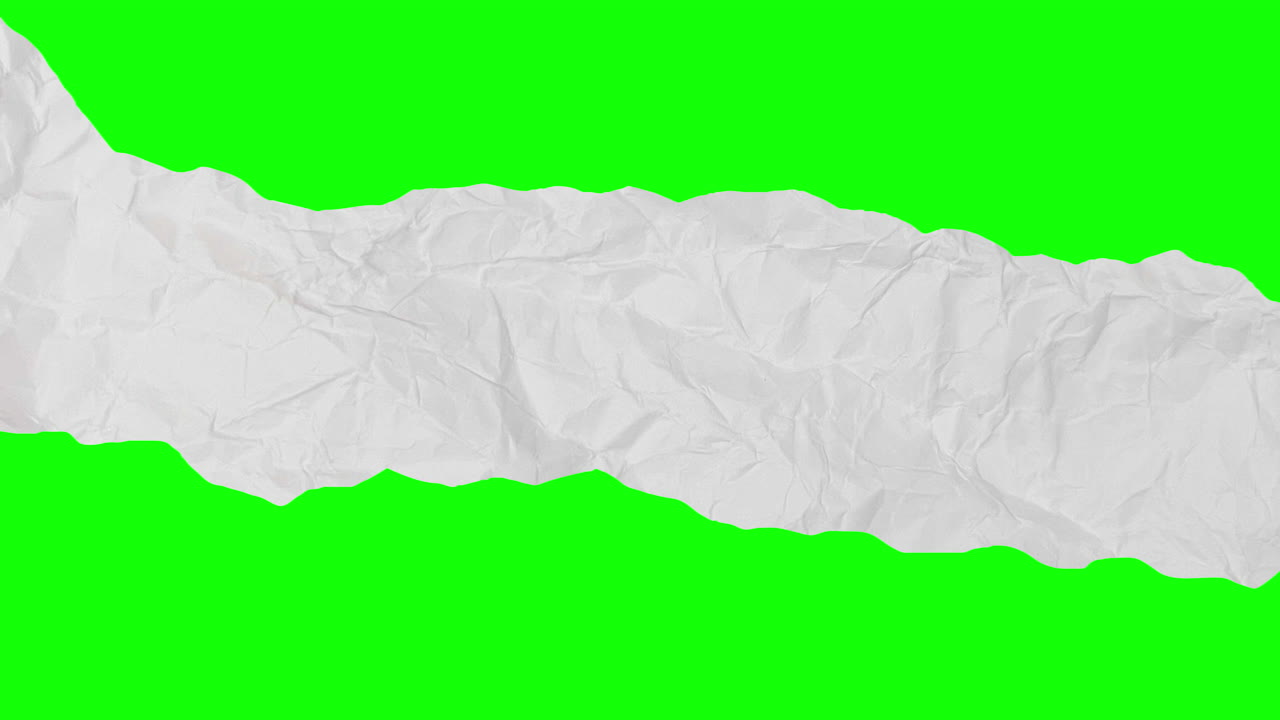 Crumpled White Paper Tearing to Reveal Green Screen