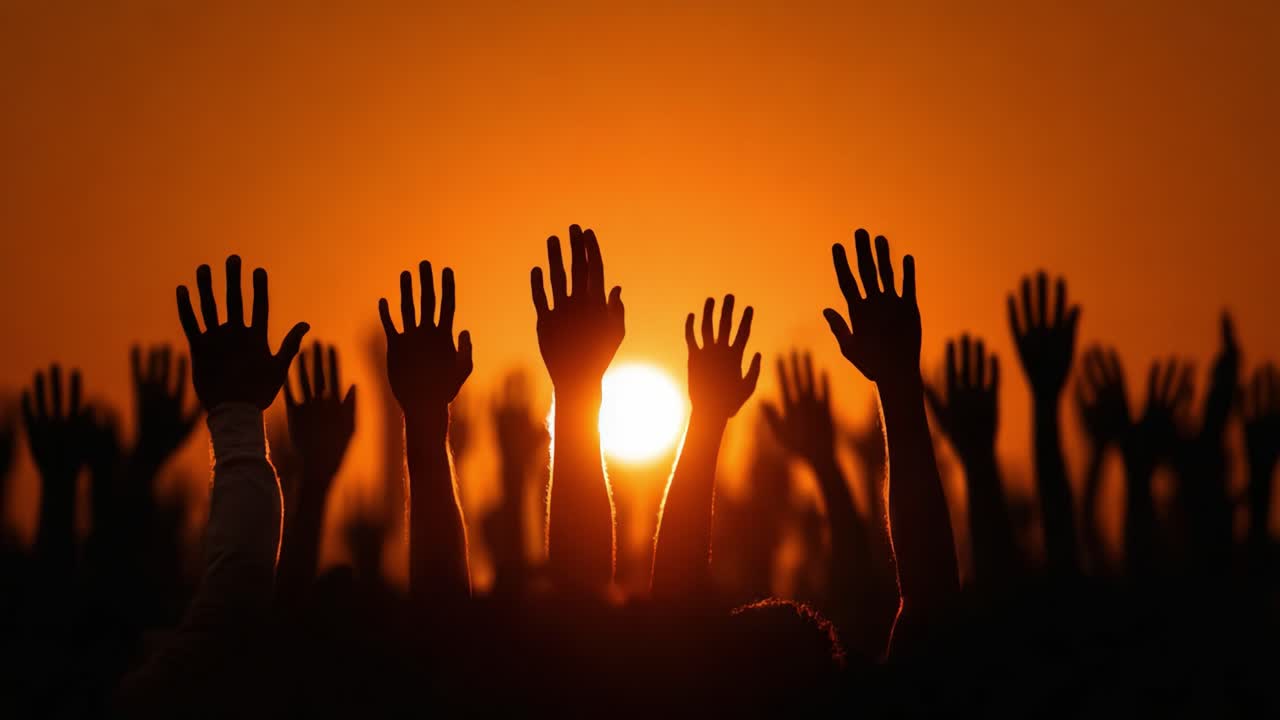 A Sea of Outstretched Hands Silhouetted Against a Vibrant Sunset, Symbolizing Unity, Hope, and the Power of Collective Action in an Inspiring Atmosphere