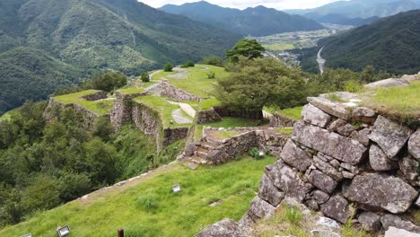 Takeda-Castle-Panoramic-Ruins-Landscape-Mountain-Valley-in-Japanese-Green-Summer-in-Asago-Hyōgo,-Japan