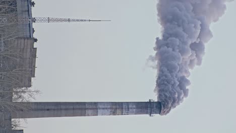 this smoke coming from the chimney in a factory. harmful emissions into the atmosphere, from the pipe. serious damage the environment.