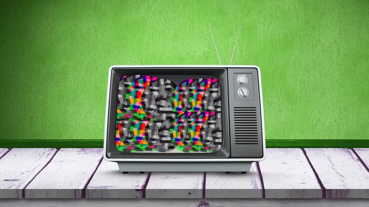 Televisor antiguo y estática de colores