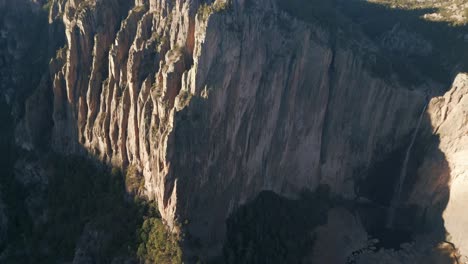 Rock-cliff-geological-formation-close-up-Basaseachic-falls-national-park-aerial-drone-Mexican-landscape,-mountains-and-skyline-in-Cascada-Chihuahua-Sierra-Madre-Occidental