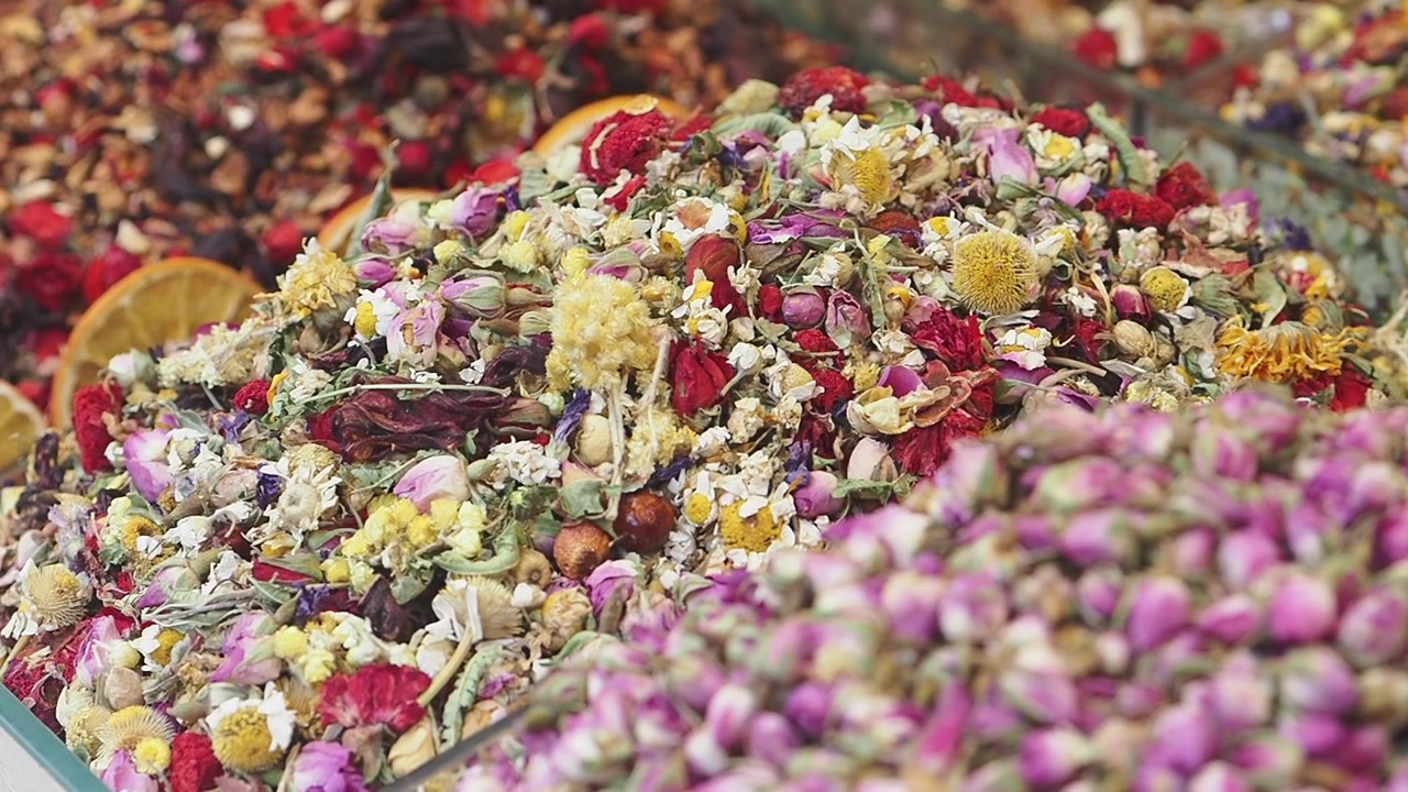 Assorted Dried Herbal Tea and Flower Petals at a Market