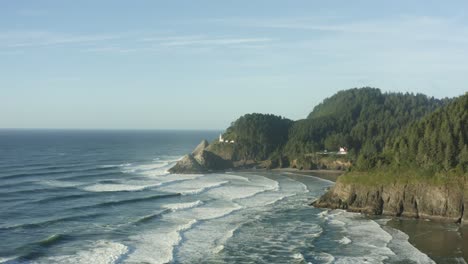 Wide-sunny-aerial-of-Oregon-coast-and-Haceta-Head-lighthouse