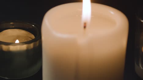 Close-Up-Of-Model-Of-Hand-Used-In-Palm-Reading-Surrounded-By-Candles-And-Crystals-3