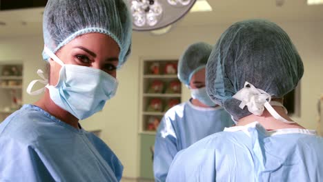 surgical team working together in operating theater