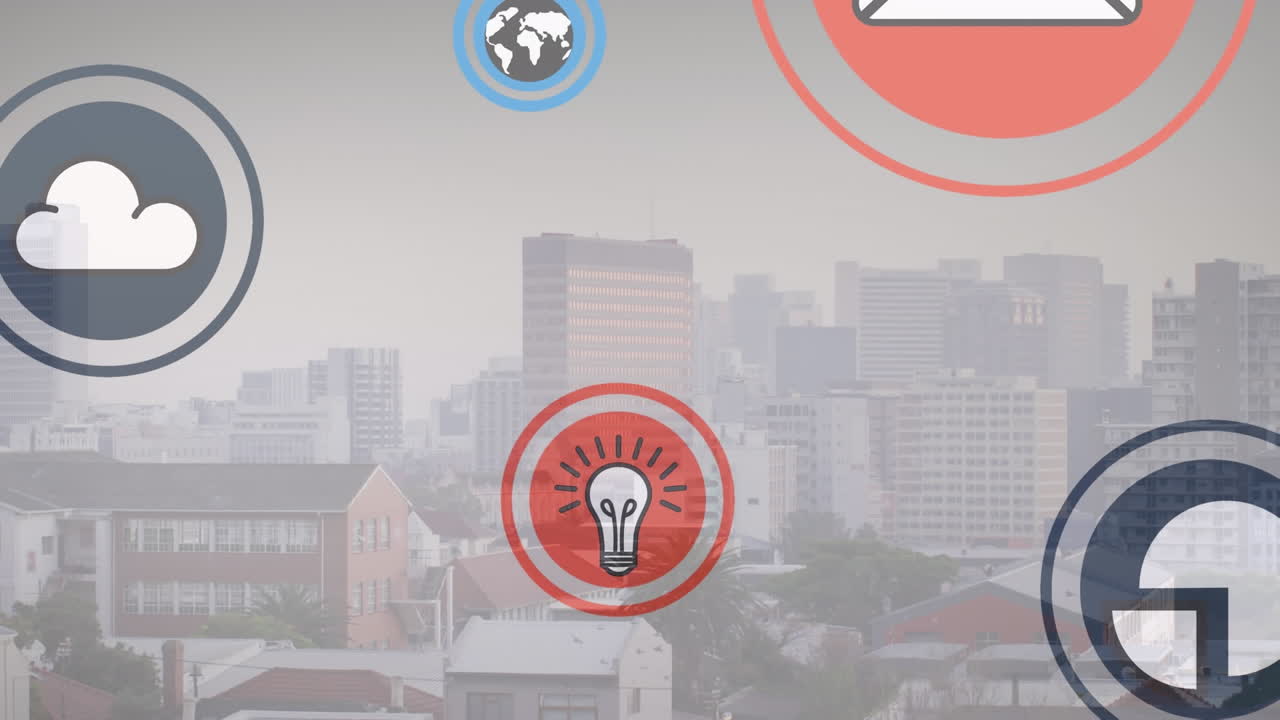 여러 디지털 아이콘이 도시 풍경의 공중 전망에 대해 떠다니는 애니메이션