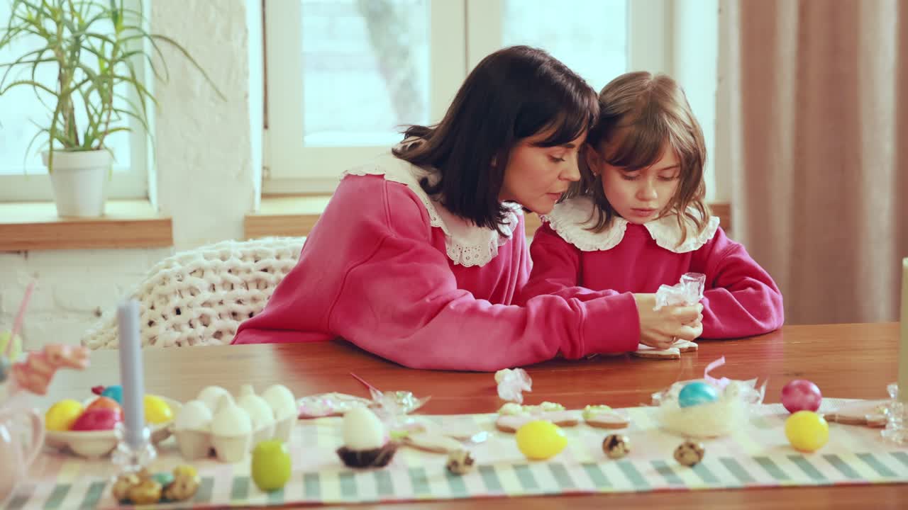 Mother and Daughter Decorating Easter Cookies