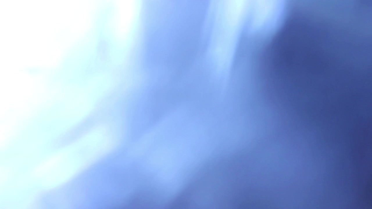 Abstract Blue Light Leaks and Lens Flare Transitions