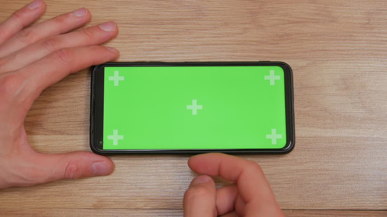 스마트폰 녹색 스크린 맨 손