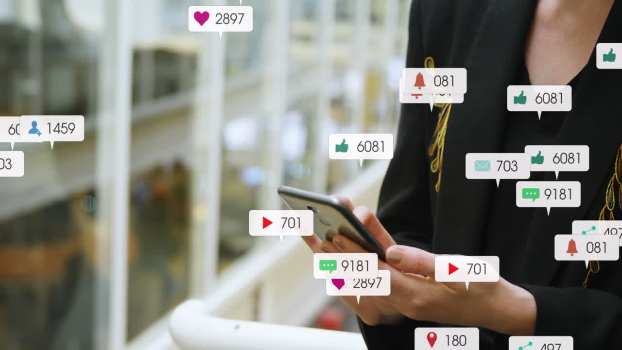 Animation of message icons with changing numbers over midsection of caucasian woman using cellphone
