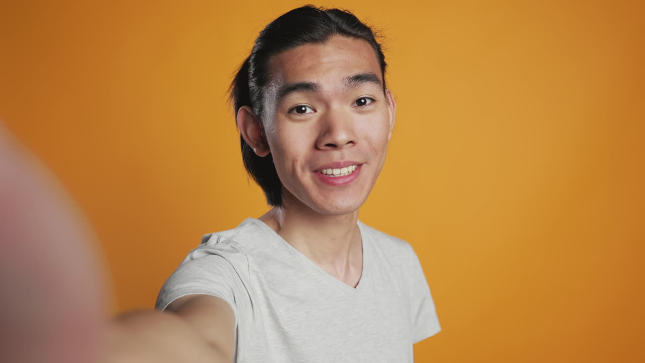 POV of modern guy talking on videocall conference