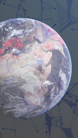 Animation of globe and shapes on grey background