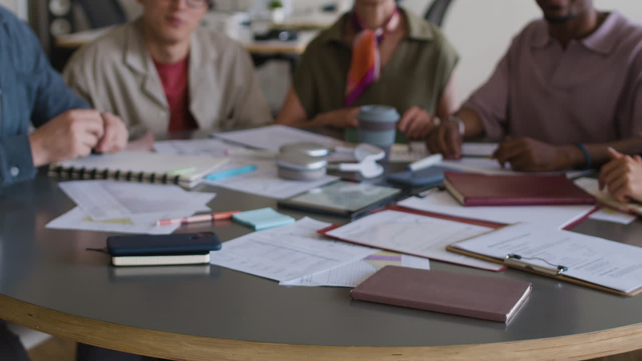 Diverse business team smiling at a meeting