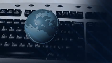 Rotating-globe-over-keyboard,-representing-global-communication-and-technology-animation