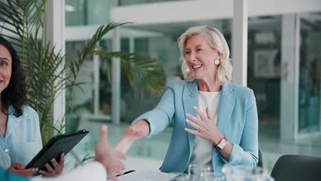 business meeting with a handshake and smiling faces