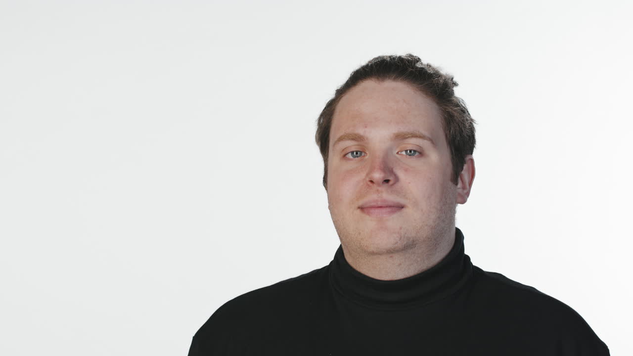 Man Waving Hand at Camera