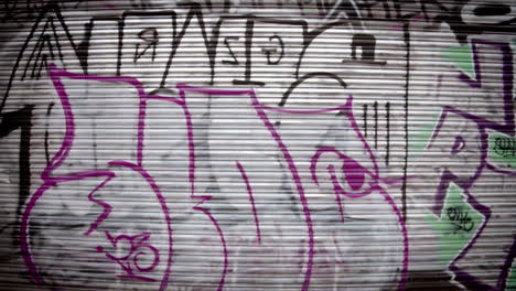 colour changing graffiti on metal shutter