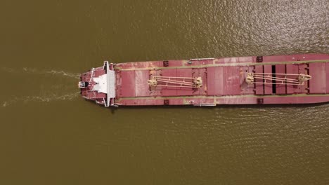 Aerial-down-shot-of-large-industrial-Cargo-vessel-on-Parana-River-during-sunny-day