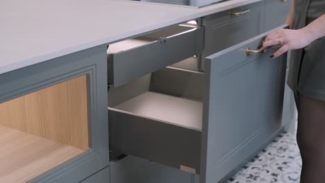 opening and closing the cabinet drawer