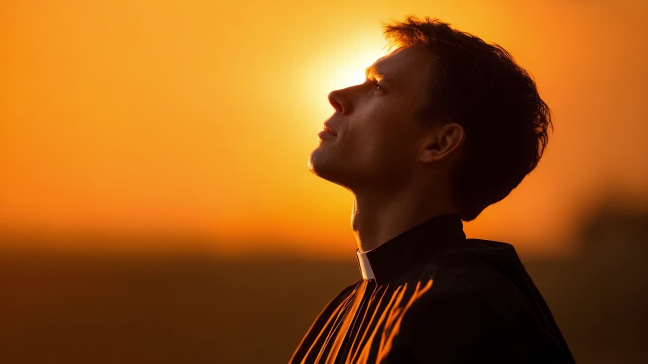 A contemplative figure in clergy attire stands against a breathtaking sunset, embodying a moment of reflection and spiritual connection with nature's beauty