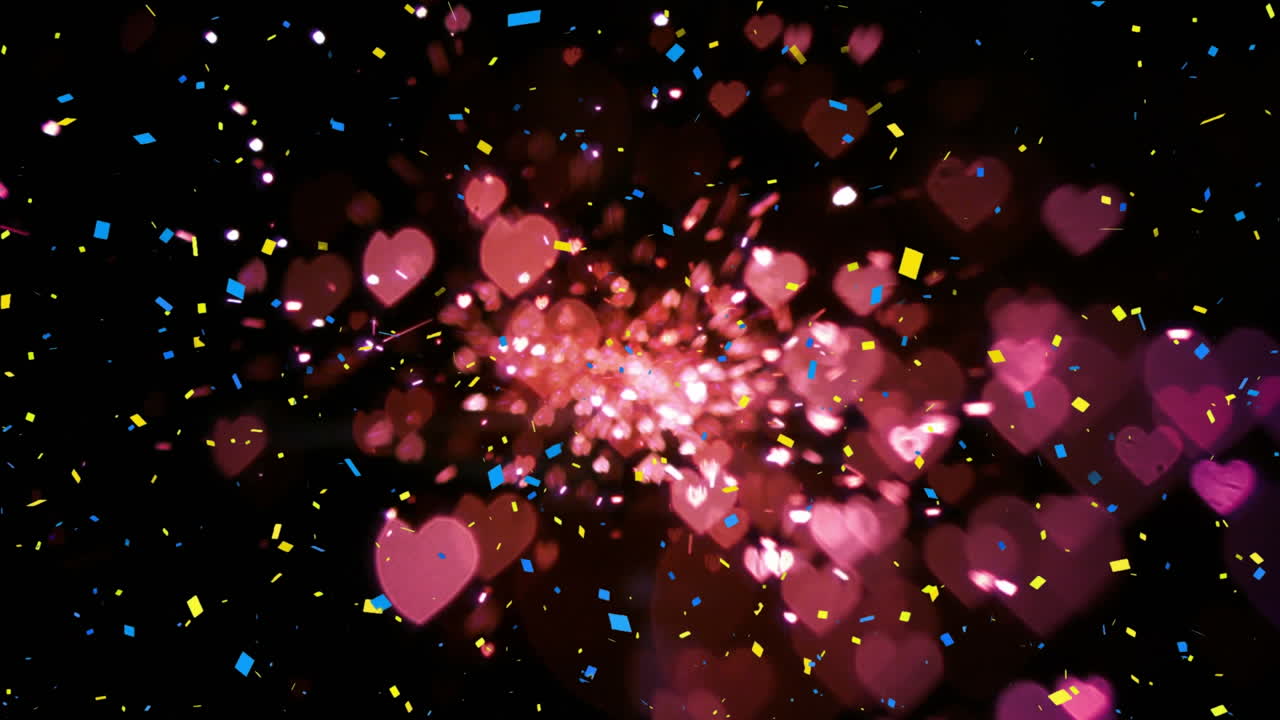 검은 바탕에 떨어지는 콘페티와 분홍색 심장의 애니메이션