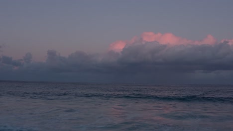 ocean waves flyby - cloudy sunset - australia