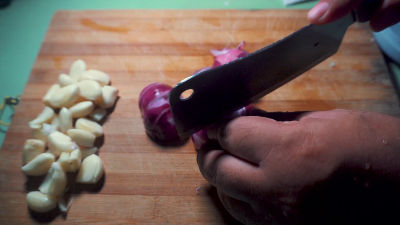 chopping chili onion and the garlic 03
